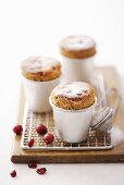 Cranberry soufflés with icing sugar