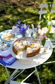 Apple cake on small table in garden