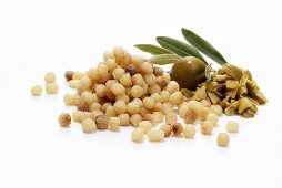 Fregola (Sardinian pasta balls) and olives