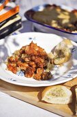 Sausage and bean bake with baguette