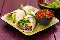 Burritos with bean puree and tomato salsa