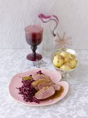 Goose breast, red cabbage with orange and potato dumplings