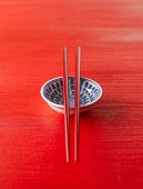 Asian china bowl with chopsticks
