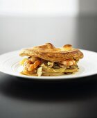 Seafood and vegetables under pastry crust