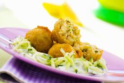 Deep-fried fish balls with cucumber salad