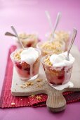 Cranberry and pear crumble with whipped cream