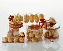 Assorted Christmas biscuits in clear biscuit boxes