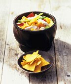 Chicken, vegetable and rice stew with nachos