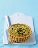 Onion, pea and Pecorino tartlet with mint
