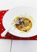 Ochsenschwanzravioli mit Parmesan und Pfifferlingen (Reste)