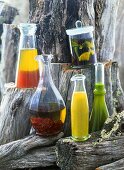 Vinaigrettes and coloured and flavoured oils