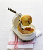 Apple peeler with apple