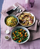 Rocket and pumpkin salad, succotash and a fennel and onion gratin