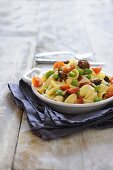 Orecchiette pasta with beans, meat dumplings and tomatoes