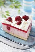 A slice of raspberry cream cake