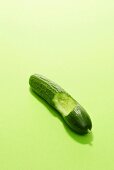 A partly eaten cucumber
