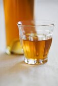 Iced tea in glass and bottle