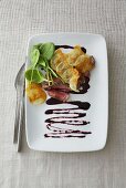 Beefsteak with potato crisps and spinach