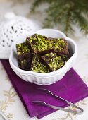 Chocolates with chopped pistachios for Christmas