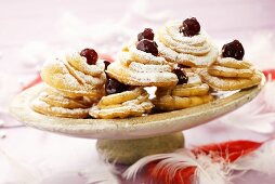 Fried pastries with cherries