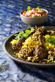 Chicken with onions and saffron rice
