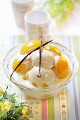 Peaches in custard