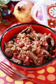 Duck goulash with pomegranate seeds