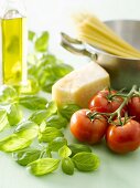 Basil, tomatoes, Parmesan, spaghetti and olive oil