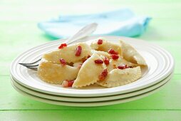 Cottage cheese, potato and onion pierogi with pancetta