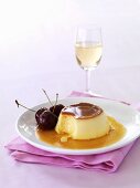 Crème caramel with cherries