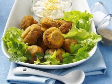 Breaded chestnut mushrooms with egg and caper sauce