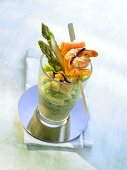 Savoury asparagus smoothie with skewered gamba