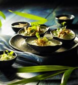 Chicken soup with rice in bowls