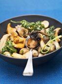 Mixed mushroom stir-fry with deep-fried parsley
