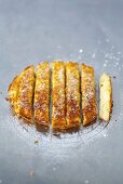 Orange sponge cake with almonds, cut into strips