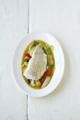 Cod in white wine and vegetable stock