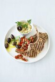 Grilled lamb chops with tomato salsa and aubergine puree