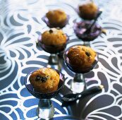 Mini rum babas with blackcurrants