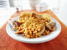 Crumpets with baked beans and sausages