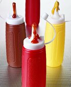 Ketchup and mustard in plastic bottles