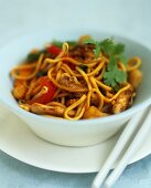 Stir-fried noodles, chicken and vegetables