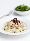 Shell pasta with a creamy bacon sauce