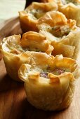 Gruyère and smoked ham in filo pastry shells