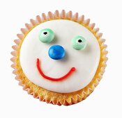 Cupcake mit lustigem Gesicht