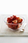 Fresh strawberries in a glass bowl