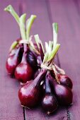 Bunches of red onions