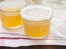 Clear goose stock in preserving jars