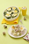 Spinach and egg bake and potato and egg salad with tatar sauce