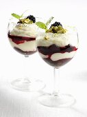 Quark cream with blackberries and pistachios