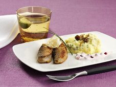 Fried herring with mashed potatoes, mushrooms and lingonberry sauce